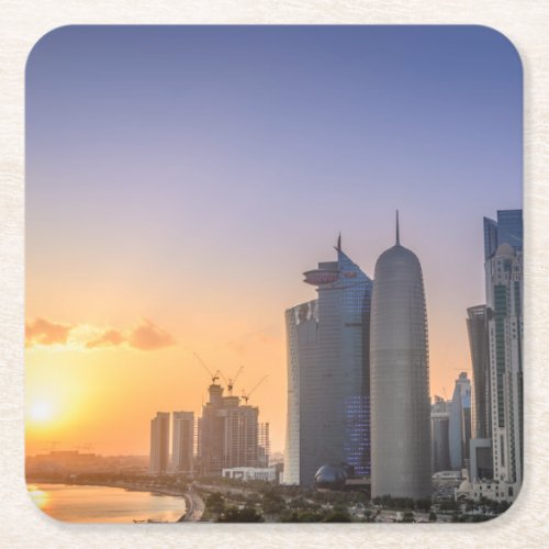 Sunset over the city of Doha Qatar Square Paper Coaster