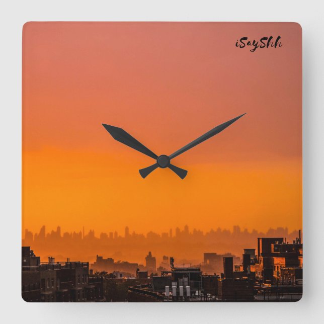 Sunset over the city square wall clock (Front)