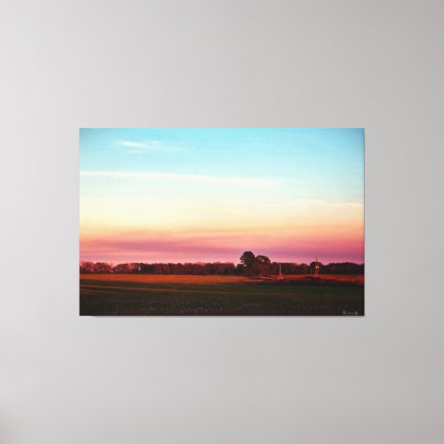 Sunset Over Verdant Field Canvas Print