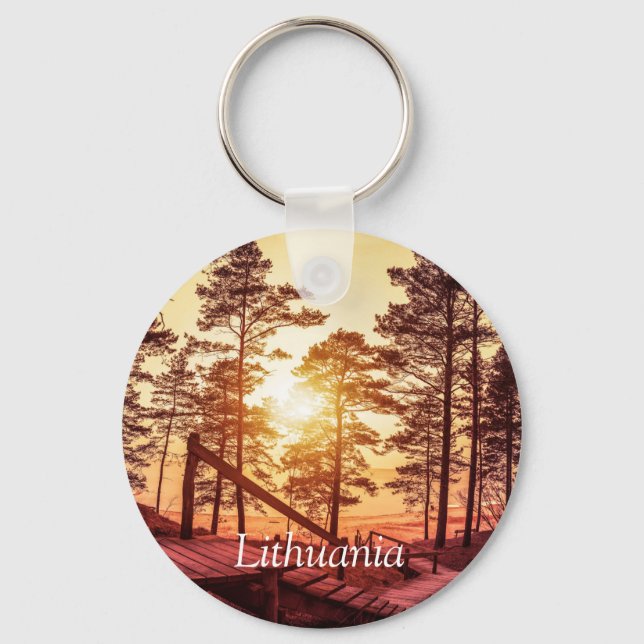 Sunset over wooden path in pine forest keychain (Front)