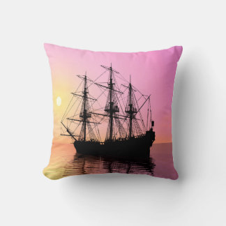 Sunset, pirate ship in quiet waters. throw pillow
