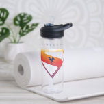 Sunset Soar Superman Shield Water Bottle<br><div class="desc">Add a cosmic twist to your superhero style with this radiant Superman design! Set against a deep navy backdrop, the classic “S” shield glows in a warm gradient of fiery orange, golden yellow, and sunset pink—capturing the beauty of Superman’s power and hope. A silhouette of Superman streaks across the emblem...</div>