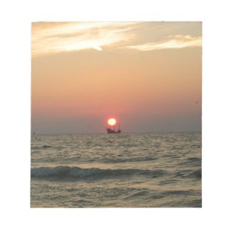 Sunset with pirate boat notepad
