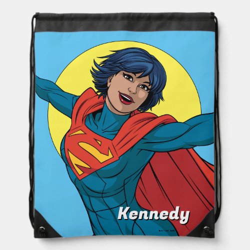 Supergirl Flying in Blue Suit Drawstring Bag