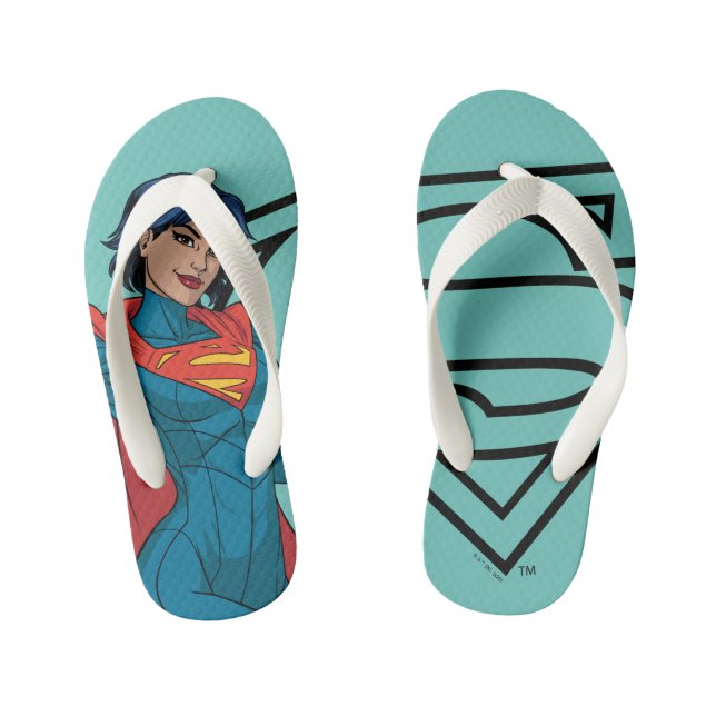 Supergirl Hovering in Blue Suit Kid's Flip Flops (Footbed)