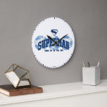 Superman Across the Globe Large Clock<br><div class="desc">Celebrate Superman’s global legacy with this bold, minimalist design that spans the world! Featuring a trio of globe silhouettes in cool shades of blue, this artwork proudly displays the Superman name arched across the center, with the classic “S” shield soaring above. The phrase “LOOK UP IN THE SKY” completes the...</div>