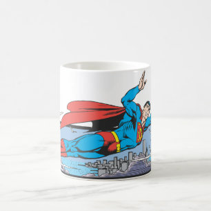 Superman Flies Thru City Coffee Mug