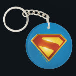 Superman Golden S Shield Brilliance Keychain<br><div class="desc">Shine bright with the legendary symbol of hope! This stunning design features the iconic Superman “S” shield rendered in radiant gold and deep crimson, glowing with heroic intensity against a bold blue background. The sleek metallic finish and rich color gradients give this emblem a powerful, modern edge—perfect for fans who...</div>