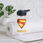 Superman Golden S Shield Brilliance Water Bottle<br><div class="desc">Shine bright with the legendary symbol of hope! This stunning design features the iconic Superman “S” shield rendered in radiant gold and deep crimson, glowing with heroic intensity against a bold blue background. The sleek metallic finish and rich color gradients give this emblem a powerful, modern edge—perfect for fans who...</div>