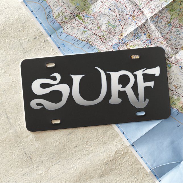 Surf black plastic car license plate (In Situ)