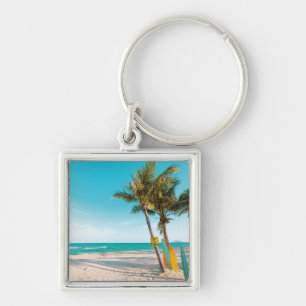 Surf boards on beach throw pillow keychain