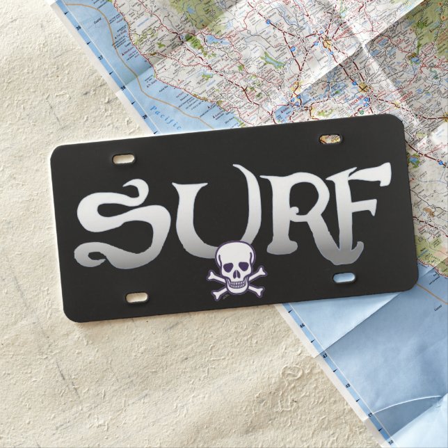 Surf w Skull black plastic car license plate (In Situ)