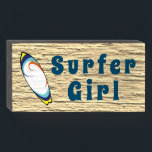 "Surfer Girl Surfboard" Sandy Beach Wood Box Sign<br><div class="desc">Simple Minimalist Rustic Wood Sign - Wall Plaque or Shelf Sitter Signage for Your Home, Office Cubicle or Shop Decor. "Surfer Girl Surfboard" Sandy Beach Love the Beach! Black Wood Box Sign Light Sandy Wood Image Front Ocean Blue Text At VanOmmeren we live our dream and create amazing designs for...</div>