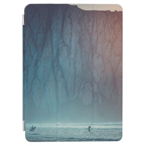 SURFER ON BODY OF WATER NEAR SEA CLIFF DURING DAYT iPad AIR COVER