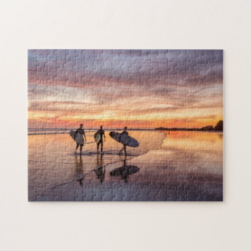 Surfers At Sunset Walking On Beach Costa Rica Jigsaw Puzzle