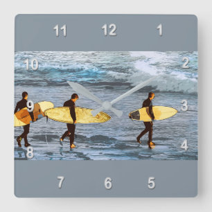 Surfers Head Into the Ocean to Catch the Last Wave Square Wall Clock