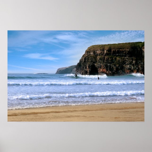 surfers surfing near Ballybunion cliffs Poster (Front)