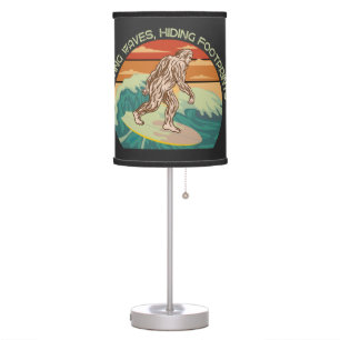 Surfing Bigfoot Hunting Waves Hiding Footprints Table Lamp