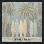 Surf's Up, Pastel Style Personalized Stone Coaster<br><div class="desc">A tranquil beach scene invites you to unwind. Pastel-colored surfboards, like giant candy bars, lean against the trunks of swaying palm trees. The ocean whispers promises of adventure and sun-kissed skin. It's hard to imagine, but early Hawaiian surfboards, called "alaia, " were made from a single, heavy piece of wood...</div>