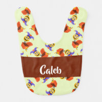 Surprise box toy on green baby bib