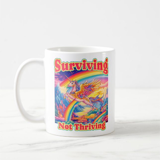 Surviving Not Thriving – Rainbow Unicorn Mug (Left)