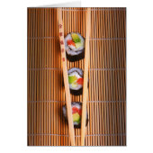 Sushi and wooden chopsticks (Front)