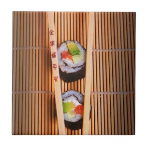 Sushi and wooden chopsticks ceramic tile