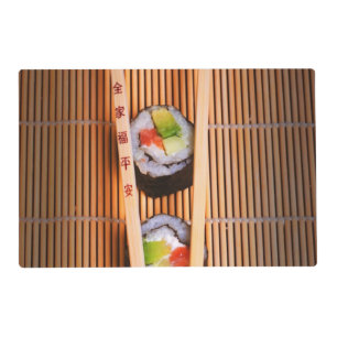 Sushi and wooden chopsticks placemat