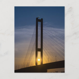 Suspension Bridge at Sunrise Against a ColorfulySk Holiday Postcard