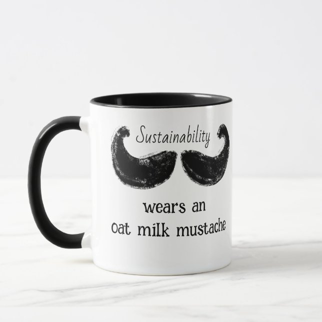 Sustainability Wears An Oat Milk Mustache Mug (Left)