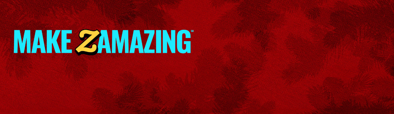 Festive yellow backdrop with pine garland on top. Bold text says ‘Make Zamazing.’ Two cheerful gifts sit below, each topped with a custom photo ornaments. One of a cute dog, the other of a smiling couple. Cozy hands hold the larger box wrapped in a pattern tigers and Christmas trees.