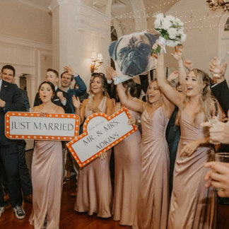 A vibrant flat lay of disco-inspired accessories, including colorful glasses and playful signage. Bright, saturated hues create energetic movement. The composition feels festive and youthful. It channels dance-floor excitement and celebratory flair.