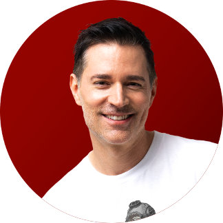 A man against a red background.