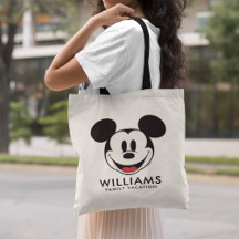 Person carrying personalized name Disney's Mickey Mouse tote bag
