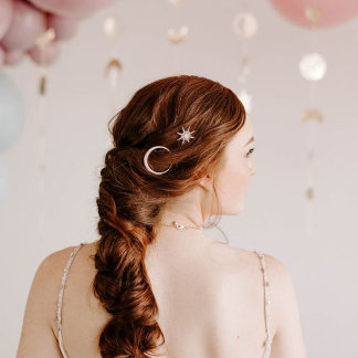 This gorgeous bride has subtle moon and star hair accessories that really tie in with this theme.