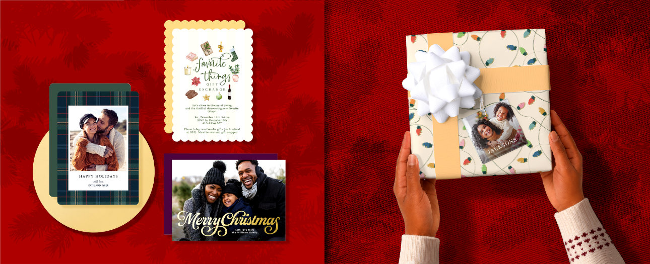 Flat lay of holiday cards, envelopes, and festive greenery on a marble surface. A green photo card with a family and the words ‘Cherish Joyful Memories 2025.’ Nearby are pink envelopes with ‘Fa La La’ liners, a phone showing the same family photo, stickers, a self-inking stamp, and mailing accessories.