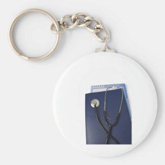 medical stethoscope on blue folder keychain