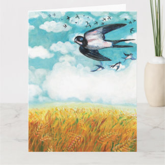 Swallows flying over a wheat field card