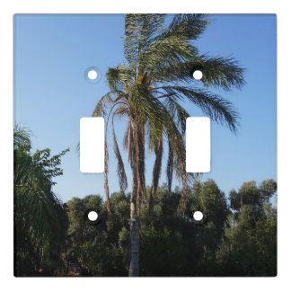 Swaying Palm Tree Under a Clear Sky Light Switch Cover