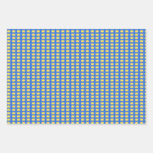 Swedish crowns in blue and yellow wrapping paper sheets