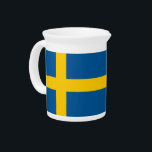 Swedish Flag on Pitcher<br><div class="desc">Enhance your serving experience with our stylish pitcher featuring the flag of Sweden! This eye-catching pitcher is more than just a functional piece; it’s a tribute to Swedish heritage and cultural pride. The vibrant design prominently displays the iconic Swedish flag, making this pitcher a unique way to serve beverages while...</div>