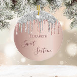 Sweet 16 birthday rose gold pink ceramic ornament<br><div class="desc">An ornament for a girly and glamorous Sweet 16th birthday. A faux rose gold background with an elegant rose gold and drips, paint dripping look. The text: Sweet Sixteen is written in dark rose gold with a large modern hand lettered style script. Personalize and add a name. Perfect as party...</div>