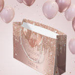 Sweet 16 rose gold blush glitter balloons large gift bag<br><div class="desc">A gift bag for a glamorous Sweet 16,  16th birthday party. A rose gold,  blush background with faux glitter drips,  paint dripping look and balloons. The text: The name is written in dark rose gold with a modern hand lettered style script. Personalize and add a date and name.</div>