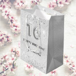 Sweet 16 silver glitter dust monogram birthday medium gift bag<br><div class="desc">Elegant,  classic,  glamorous and girly for a Sweet 16,  16th birthday party.  A silver metallic background. Decorated with glitter dust. Personalize and add a name.  With the text:  Happy Birthday.  The name is written with a modern hand lettered style script.   Number 16 is written with a balloon style font.</div>