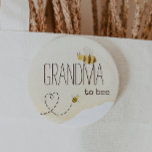 Sweet Bumblebee Baby Shower Grandma To Bee Button<br><div class="desc">Introducing our sweet bumblebee baby shower grandma to bee button, perfect for a delightful, gender-neutral celebration! This joyful design features an adorable bumblebee theme with sweet heart trails, creating a whimsical, boho-inspired watercolor scene ideal for welcoming a little boy or girl in a bright cheerful way. If you have any...</div>