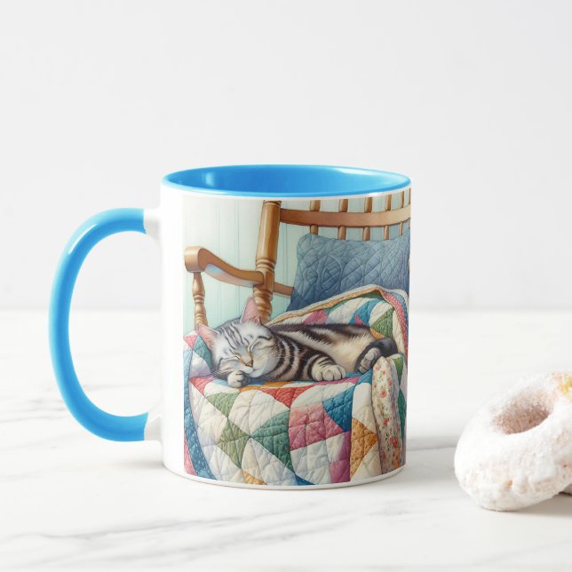 Sweet Gray Cat Sleeping on a Quilt Mug (With Donut)