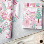 Sweet Pastel Pink Gingerbread Village Christmas Wrapping Paper<br><div class="desc">Celebrate the sweetness of the festive season with our Pastel Pink Christmas Gingerbread Houses Wrapping Paper. This delightful design showcases intricately detailed gingerbread houses in soft pink tones, evoking memories of holiday baking and joyous celebrations. Ideal for wrapping gifts with a touch of whimsical charm, this paper is sure to...</div>