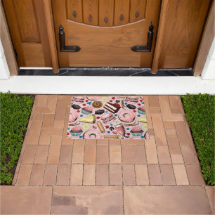 Sweet treats on pink doormat