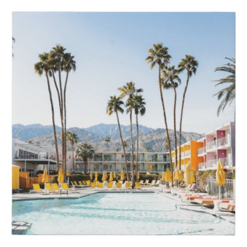 Swimming pool near palm trees in the morning faux canvas print