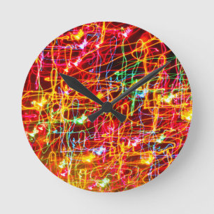 Swirling Neon Lights Glowing Round Wall Clocks